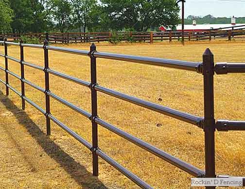 Four rail pipe fence painted