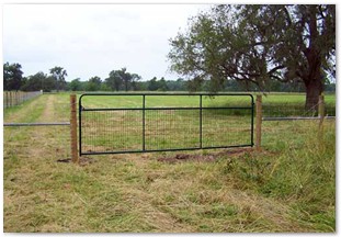 Field fence with five inch round posts and 4x4 wire