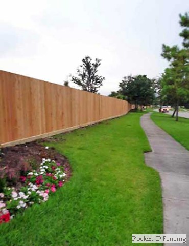 Four rail pipe fence painted