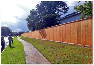 Eight foot capped western red cedar fence with metal posts