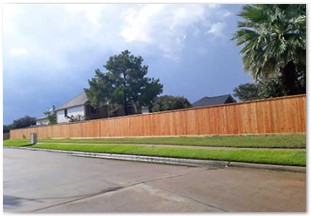 Eight foot capped western red cedar fence with metal posts (2)