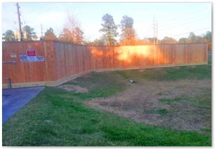 Nine foot capped western red cedar fence with metal posts