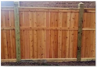 6.6ft Capped western red cedar fence with 6x6 posts pointed and decorative engraving on top