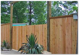 Cedar fencing with ranch style gateway